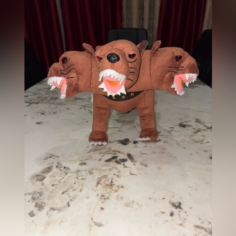 Triple-Headed Brown Plush Creature
